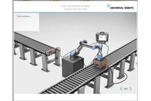 Uczestnik Akademii UR uczy się, jak zaprogramować ramię robotyczne 