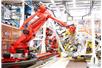 Comau docenione przez General Motors
