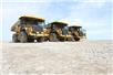 Trucks on new construction site iStock Trucks on new construction site iStock