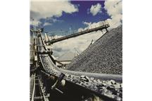 Pomiar masowego przepływu materiałów sypkich na przenośnikach