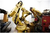 Roboty przemysłowe Fanuc ArcMate 100i z kontrolerami R-J2